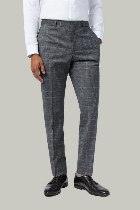 Gray checkered suit pants worn by a person on a white background